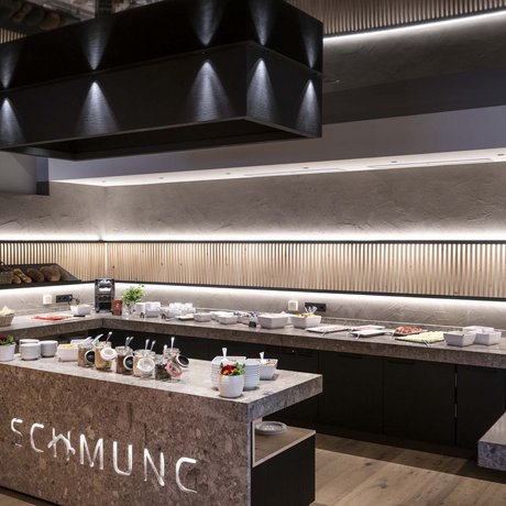 Hotel Schmung: our picture gallery Modern breakfast buffet with breads and spreads in stylish kitchen