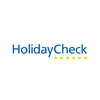 Hotel Schmung: Urlaub im Einklang mit der Natur HolidayCheck Logo mit blauem Text und gelben Punkten
